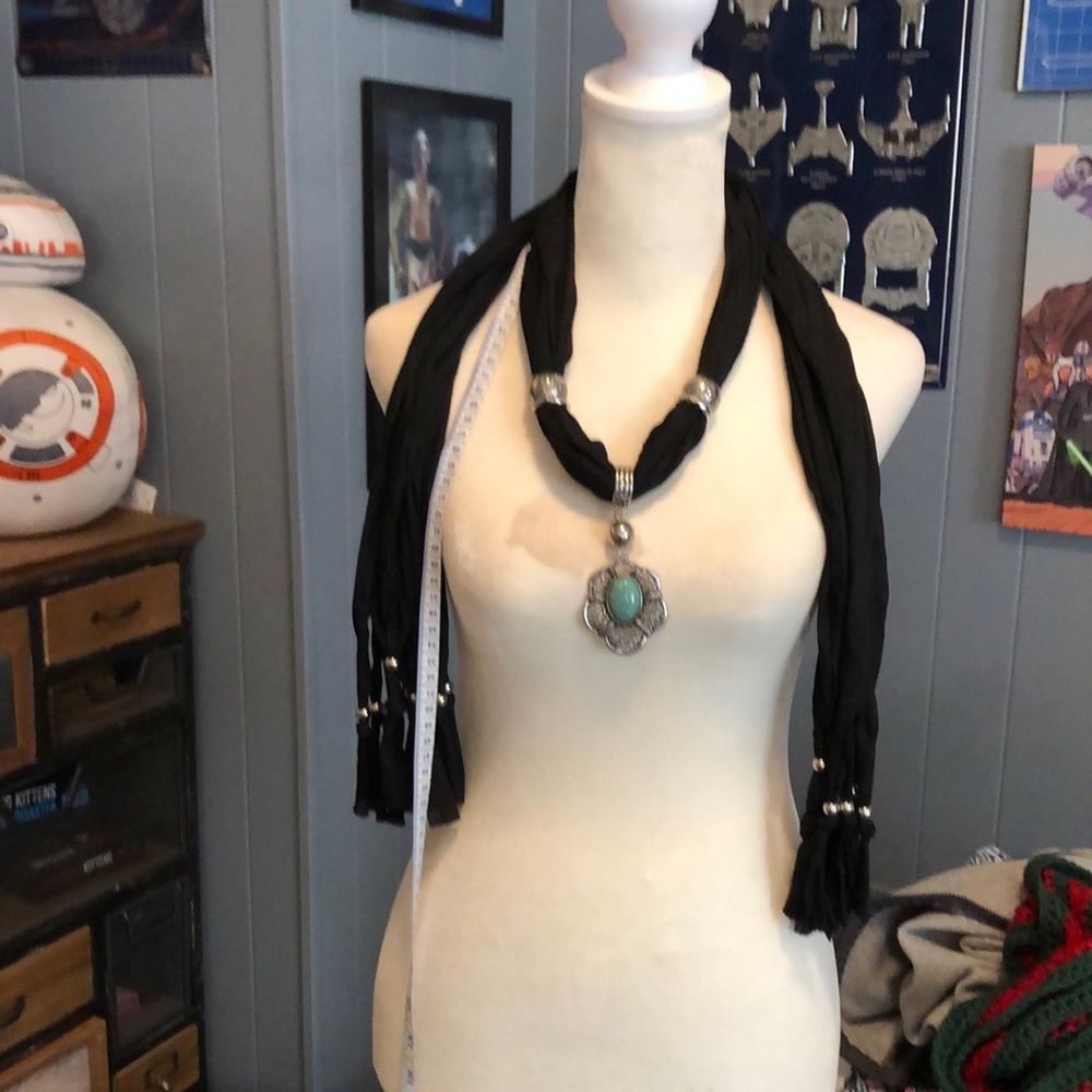 One size fits all. Black scarf .